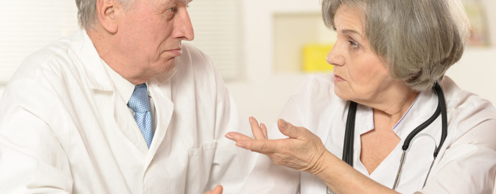Elderly doctors working
